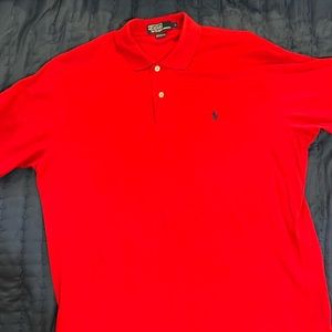 This is a large red polo shirt.